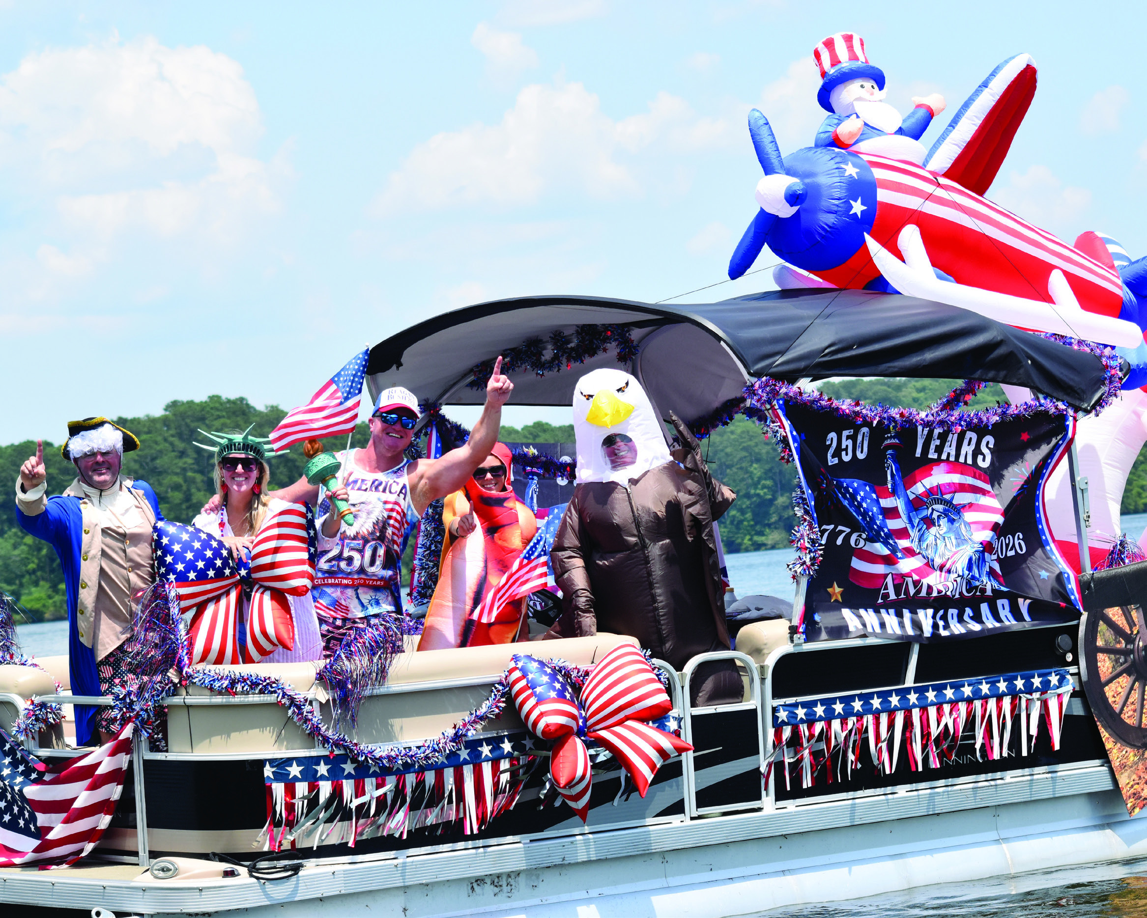 George Washington, Lady Liberty, and the American Eagle — each was well represented Saturday on Lake Oconee during the USA’s 250th anniversary celebration. SEE MORE CELEBRATIONS >> PAGES C1 &amp; B1 T. MICHAEL STONE/Staff