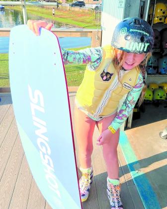 Ana poses with a new cable park wakeboard. CONTRIBUTED