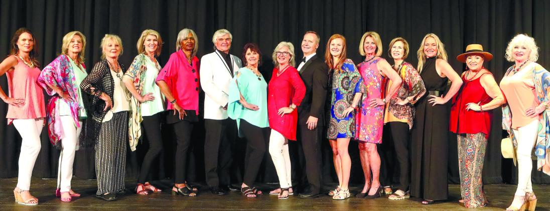 Following the fashion show, models, presenters and organizers gathered on stage from l-r: Ashley Culberson, Lisa Hanscom, Diana Arendt, Juleen DuBois, Josephine Giles, Rick Franks, Suzanne Ramsey, Melinda Spivey, Dr. Jay Spivey, Sarah Spivey, Charlotte Mosteller, Charlotte Engel, Tammy Beatty, Nellie Quiros and Cindy Falanga.