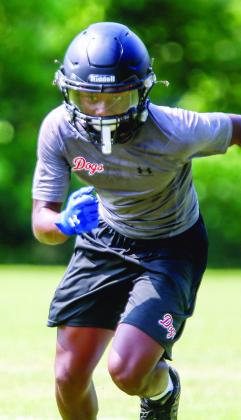 Morgan County freshman wide receiver De’Anthony Harris runs a route in an attempt to get open. LANCE McCURLEY/Staff