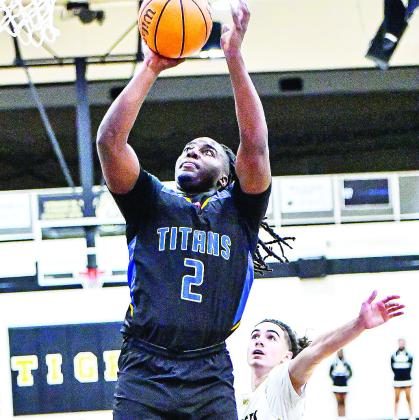 Titan senior power forward Ja'quon Hall (2) is one of the team's top post players this year.LANCE MCCURLEY/Staff