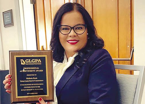 Eatonton native Melissia Rusk said she was “surprised” and “excited” upon receiving the 2022 GLGPA Professional Achievement Award. CONTRIBUTED