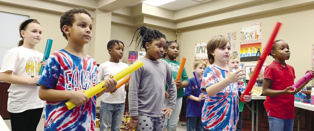 PCPS first graders prepare to show off their “boomwhacker” skills to members of the Putnam County Board of Education.