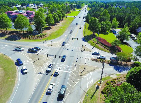 The new roundabout at Carey Station Road and Highway 44 is expected to improve traffic flow at the intersection, especially in mornings and afternoon for pickup of students at Lake Oconee Academy. MARK ENGEL/Staff