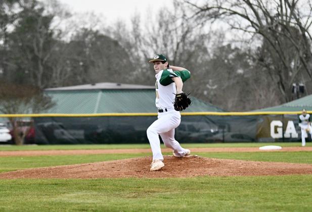 Gatewood pitcher Wilson Moore (10) winds up for a pitch on the mound in a loss to Loganville Christian Academy last week. DAWN SINCLAIR/Contributed