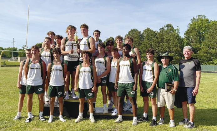 The Gatewood Schools’ boys track-and-field team won the Region 4AA championship last week, led by head coach Jeff Ratliff (right, in hat). TREY NORRIS/Staff