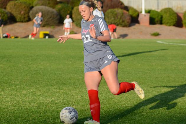 Lady Dogs' junior Camp Stamps dribbles the ball downfield. She had the game's first goal on Tuesday against Long County. LANCE MCCURLEY/Staff