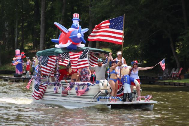 This pontoon boat, filled with a lot of patriotic pride, won the prize for the most-decorated boat. LANCE MCCURLEY/Staff