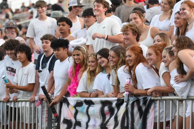 Part of the Morgan County High School student section poses for a photo during Friday’s game. LANCE MCCURLEY/Staff
