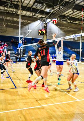 Morgan County senior Abby Dennard (11) was named the state championship match’s MVP, finishing with a team-high 16 kills. CHARLES JORDAN/Staff