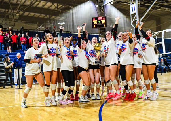 The Spike Dogs pose a photo after defeating Ringgold in the Class AA state championship match on Oct. 30. CHARLES JORDAN/Staff