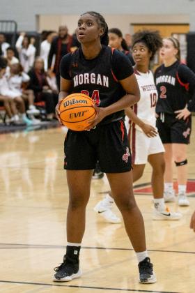 Morgan County senior guard Cydney Burke sunk two free throws late in the fourth quarter to put the Lady Dogs ahead for good. SKYLA MORRIS/Staff