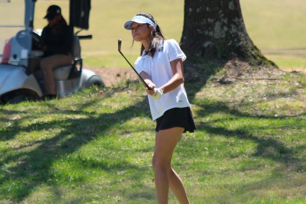 Tianna Chiplock hits her shot from the fairway. CONTRIBUTED