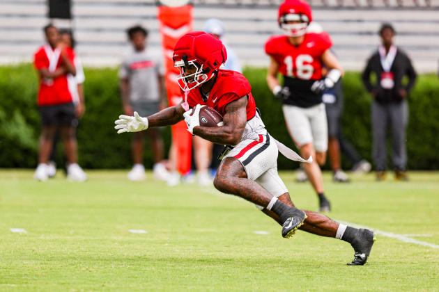 Georgia wide receiver Sacovie White-Helton cuts upfield, following his blocks in an effort to move the chains and pick up a first down. TONY WALSH/UGA Athletics