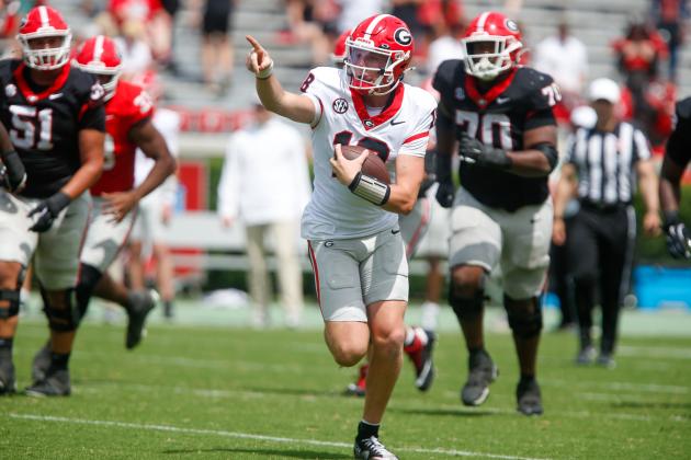 Georgia early enrollee Bryson Beaver (18) rushes for a first down during the G-Day scrimmage. LANCE McCURLEY/Staff