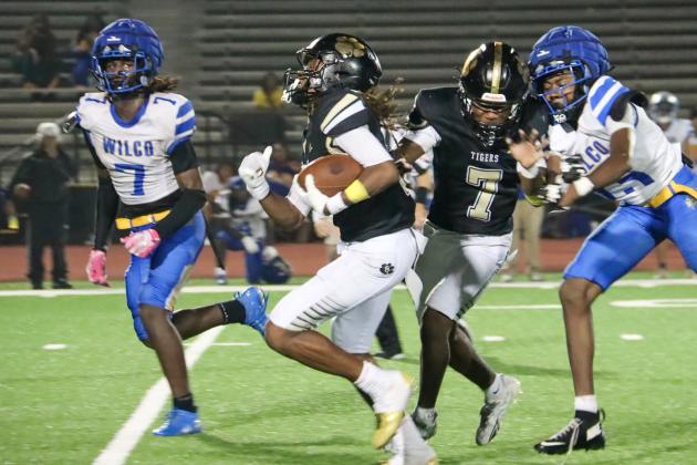 Greene County junior Kaden Cummings (3) rushed for 96 yards on eight carries and scored two touchdowns, including the game-winning score, in the Tigers’ win over Wilkinson County on Aug. 28. MOMMA D'S PIX/Contributed