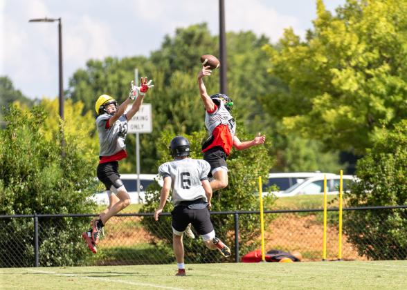Wide receiver Cole Wesley makes an athletic catch at a recent practice. He’s expected to play a major role for Morgan County on offense this season. SKYLA MORRIS/Staff