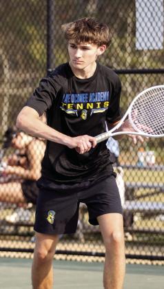 Christian Moore gets set to return a serve. SKYLA MORRIS/Staff
