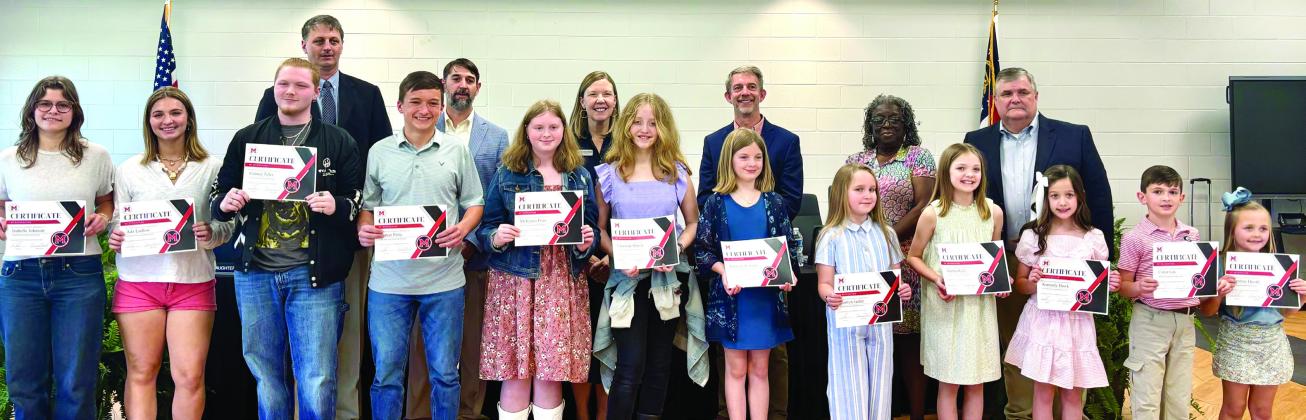 The Board of education awarded certificates to the Morgan County K-12 winners for the 2026 Young Georgia Authors competition. CONTRIBUTED