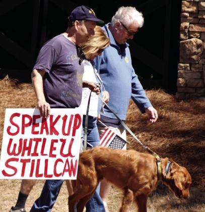 Many handmade signs were evident among local “No Kings” protestors. T. MICHAEL STONE/Staff