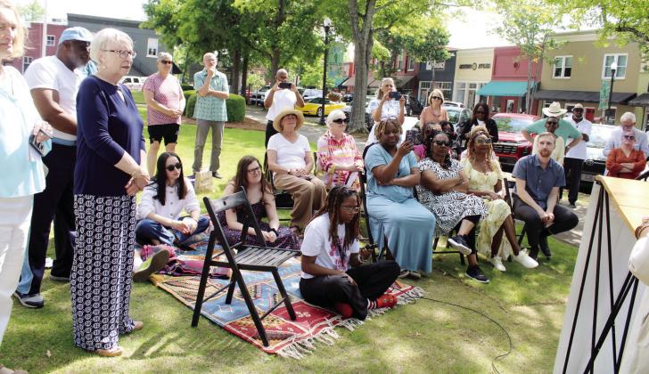 Part of the attending crowd listen as Mamie Hillman describes the work and people involved in getting the Abram Colby historical marker for Greensboro. LYNN HOBBS/Staff