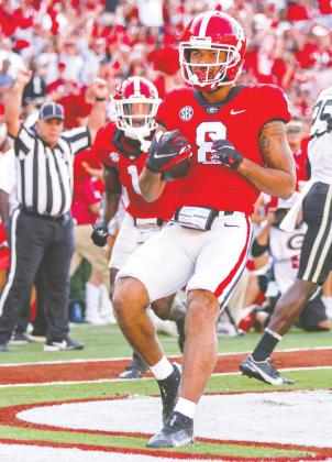 Georgia wide receiver Dominick Blaylock (8) scores his first touchdown since recovering from two knee surgeries. TONY WALSH/UGA Athletics