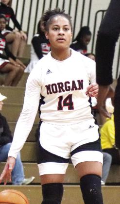 Junior Jaden Young (14) was an All-Region First Team selection for the Lady Dogs. FILE PHOTO