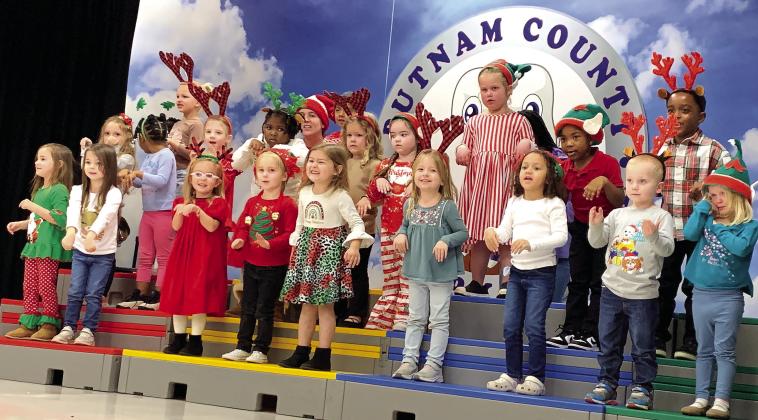 The Pre-K Carolers close the showcase by singing The Reindeer Pokey. BAILEY MCCULLY/Staff