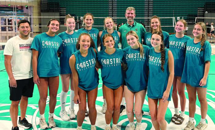 The Morgan County volleyball team poses for a photo after attending a summer camp at Coastal Carolina University. CONTRIBUTED