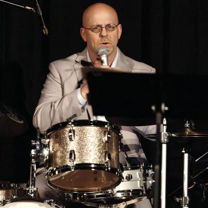 Narrator and drummer Justin Varnes. LEIGH LOFGREN/Staff
