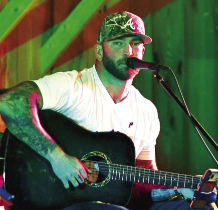 Songwriter Josh Phillips said he truly enjoyed his visit to Lake Country and thanked his “500 or so friends” who attended “Songwriters Night” at Briarpatch Farm. SKYLA MORRIS/Staff