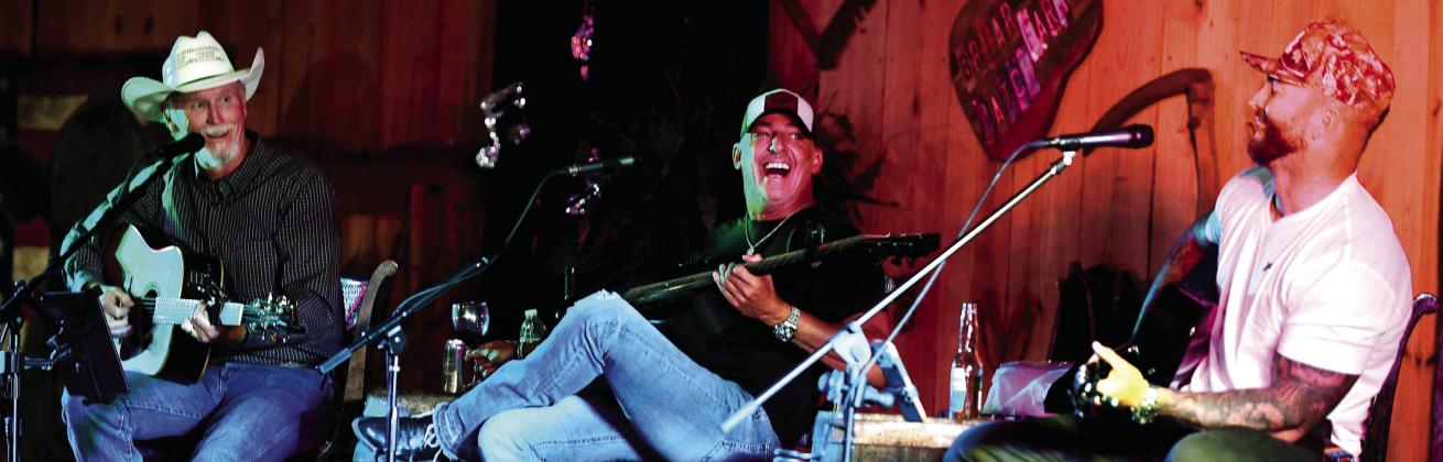With his between-songs patter, Wynn Varble (left) kept his fellow songwriters (and the audience) laughing all night long with humorous stories that inevitably ended in a bizarre, unexpected twist. SKYLA MORRIS/Staff