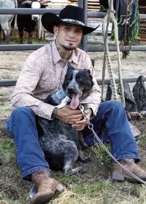 Michael Torres with his dog, Dallas. (LEIGH LOFGREN/Staff)
