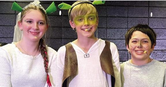 The three “Shrek Jr.” lead actors (l-r): Caylin Stancil, who played Fiona; Walker Crowder, who played Shrek; and Clyde Thrift, who played Donkey. EMME CLAUSE/Staff