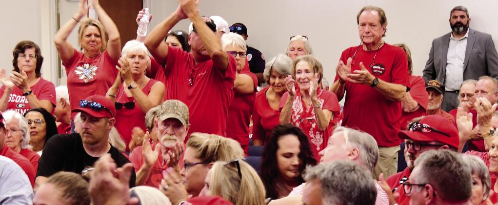 The Putnam County audience, with the majority dressed in red, was overwhelmingly supportive of speakers who opposed the quarry application. IAN TOCHER/Staff