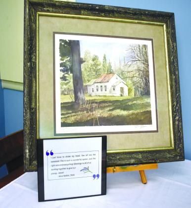 Alice Walker’s written comment about the museum was displayed beside a painting of her childhood church. BAILEY MCCULLY/Staff