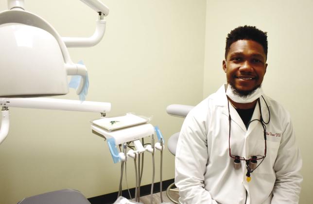 Dr. Oliver returned to his hometown of Eatonton to o_er his talent to the community that helped him achieve his dream of becoming a dentist. BAILEY BALLARD/Staff