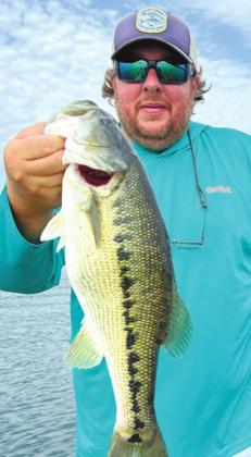 James with a Lanier spotted bass caught on a Sebile.
