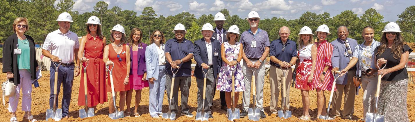 St. Mary’s and community leaders pose for a photo to celebrate breaking ground for St. Mary’s Good Samaritan Pavilion. LEIGH LOFGREN/Staff