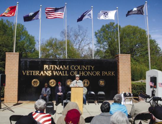 The Putnam County Veterans Wall of Honor Park includes six surrounding brick walls, with more than 1,500 bricks engraved with the names of men and women who have served in the Armed Forces. IAN TOCHER/Staff