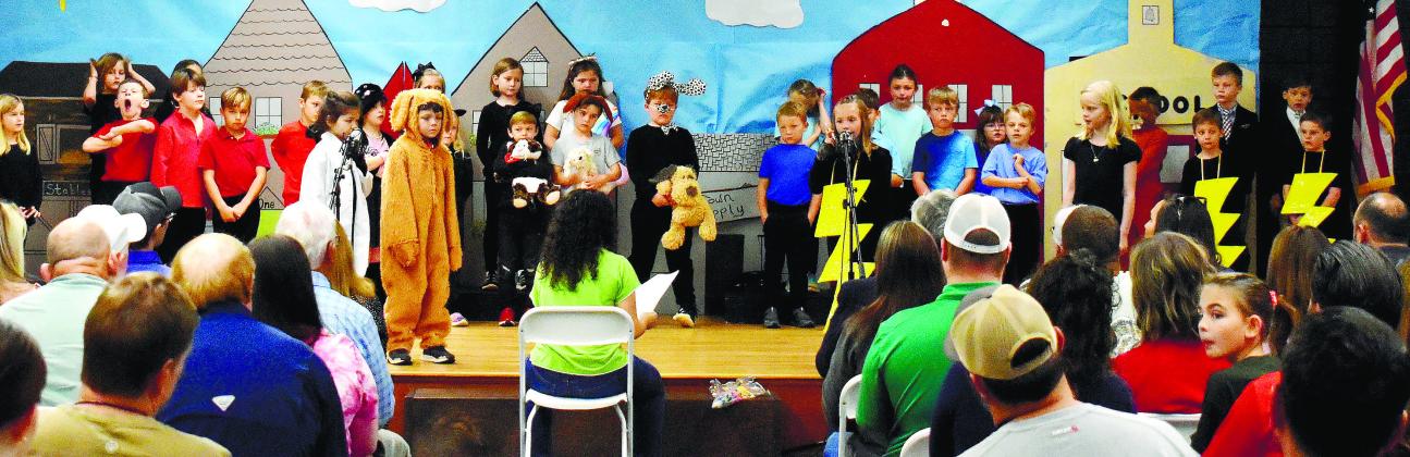 First-grade Gatewood students present their Weather Show to families and friends. LENA HENSLEY/Staff