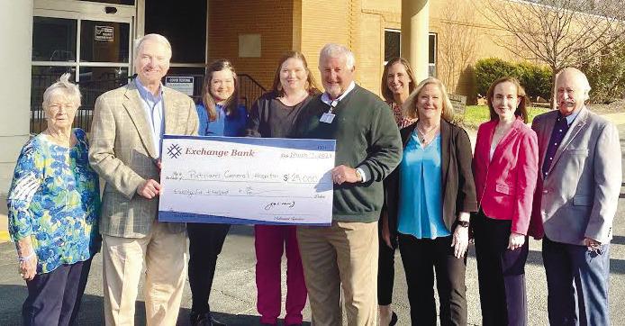 Representatives of the Exchange Bank delivered a $25,000 donation made through the Georgia HEART program earlier this year to Putnam General Hospital CEO Alan Horton (center). CONTRIBUTED