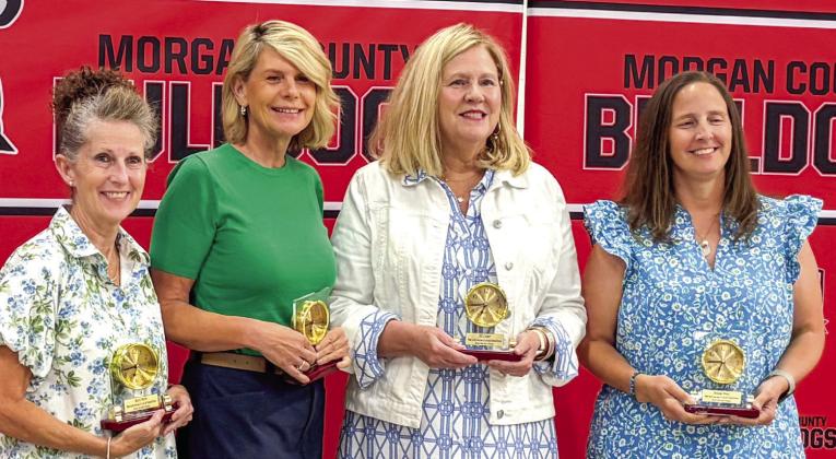 L-R: MCES retirees Betty Webb, Amy Atkinson, Jill Cooper, Melissa Ward. SKYLA MORRIS/Staff