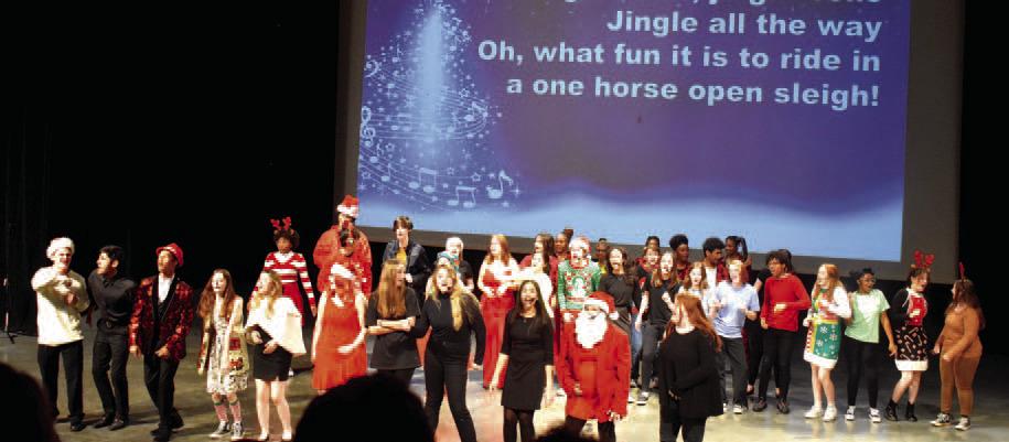 PCHS students sing a rousing version of “Jingle Bells.”