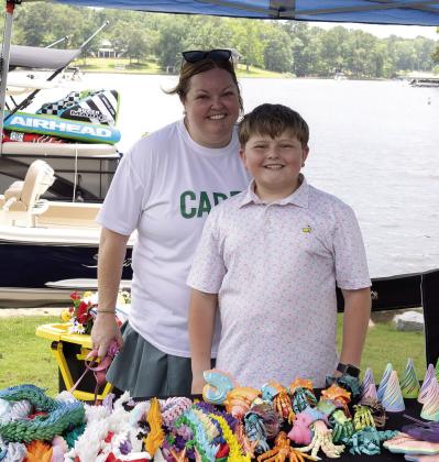 Connor and his mother, Kaya Edge. Connor designs makes and prints 3D designs for sale. LEIGH LOFGREN/Staff