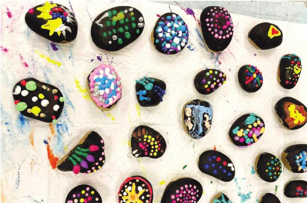 More student-painted rocks on display. CANDACE WOOTEN/Contributed