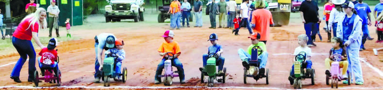 Children get to try their skills at the Kids Tractor Pedal races.