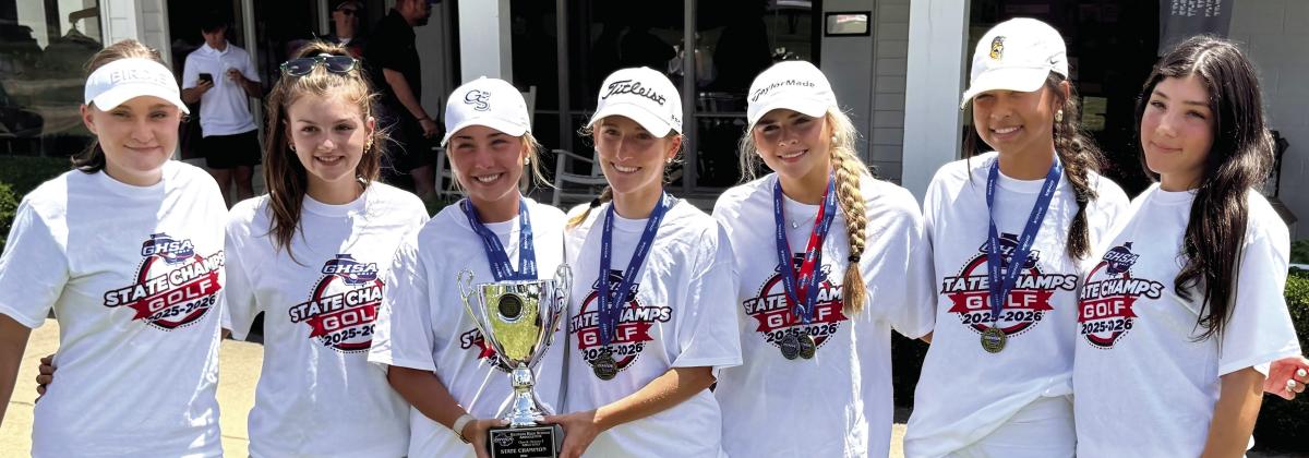 L-R: LOA girls golfers Rhys Postlmayr, Chandler Clark, Lili Nelson, Kensley Windham, Lily Dominy, Tianna Chiplock, and Ana Medrano pose for a photo after winning the GHSA Class A Division II state title. CONTRIBUTED