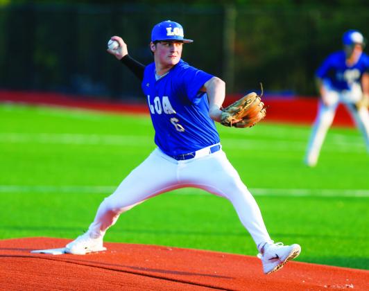 LOA’s Ty Hiter goes into his windup during the season opener against Bulloch Academy on Feb. 9. LANCE McCURLEY/Staff