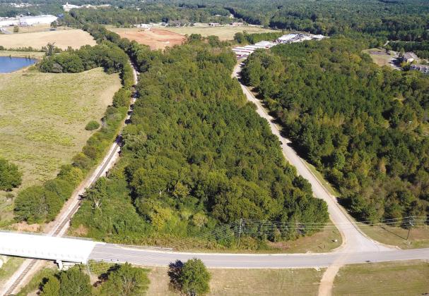 A 10.7-acre tract of land bounded by railroad tracks (left), Old Eatonton Road (lower cross street) and Town Creek Blvd (right). is up for rezoning by the City of Greensboro for a surface parking area primarily for trucks but also RVs and boats. MARK ENGEL/Staff